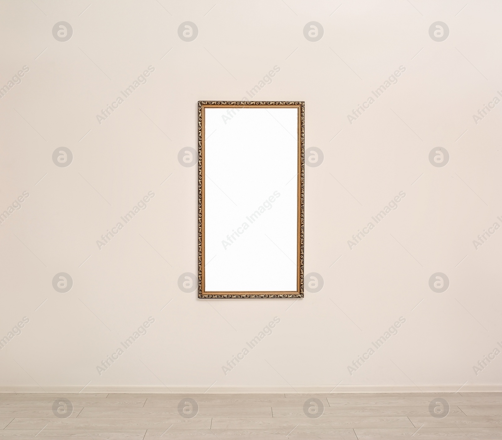 Photo of Frame with empty canvas on wall in modern art gallery. Mockup for design