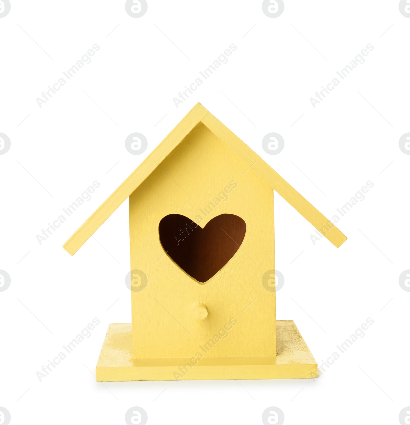 Photo of Beautiful bird house with heart shaped hole isolated on white