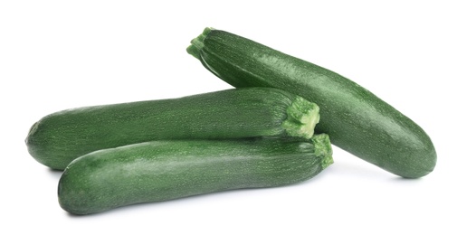 Fresh ripe green zucchinis isolated on white