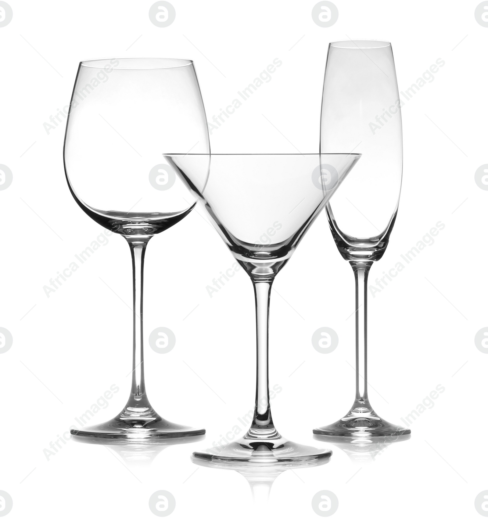 Image of Set of empty glasses on white background