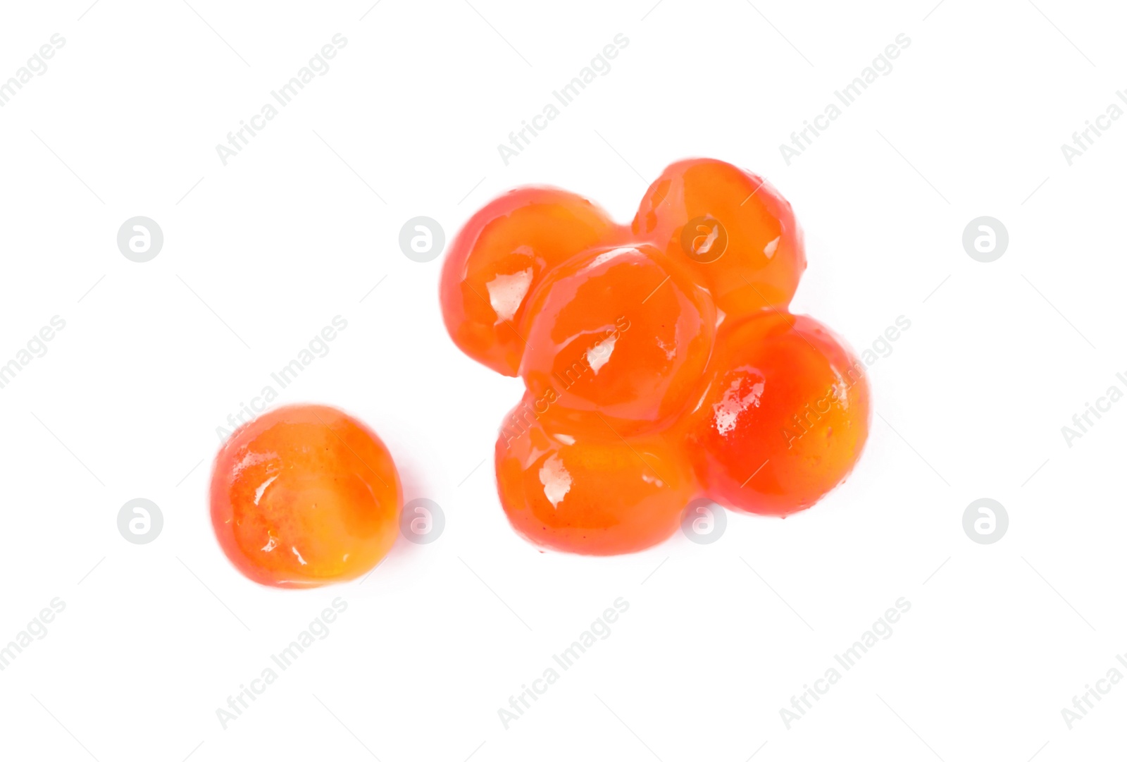 Photo of Pile of delicious red caviar isolated on white, closeup