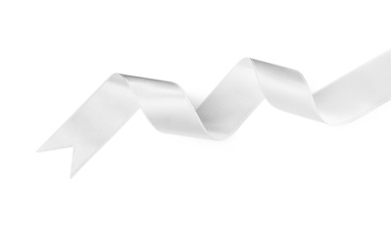 Photo of Satin ribbon on white background, top view