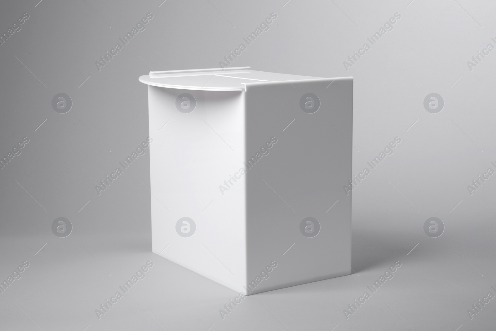 Photo of One ballot box on light grey background. Election time