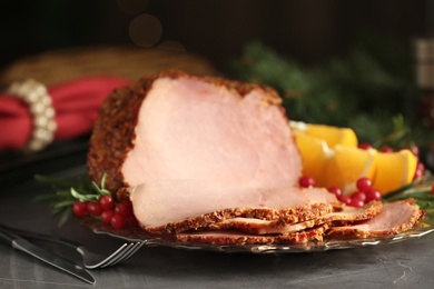 Photo of Plate with delicious ham on table, closeup. Christmas dinner