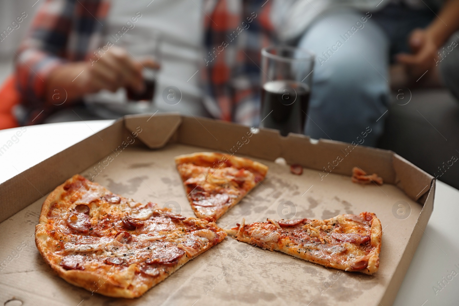 Photo of Tasty fresh pizza on table indoors, closeup