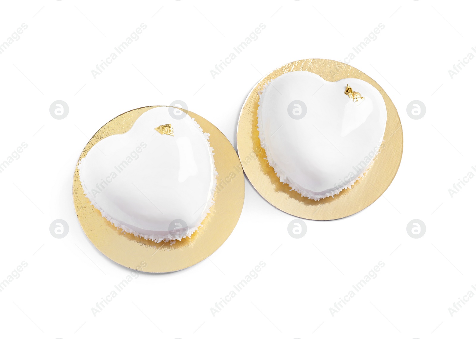 Photo of St. Valentine's Day. Delicious heart shaped cakes isolated on white, top view