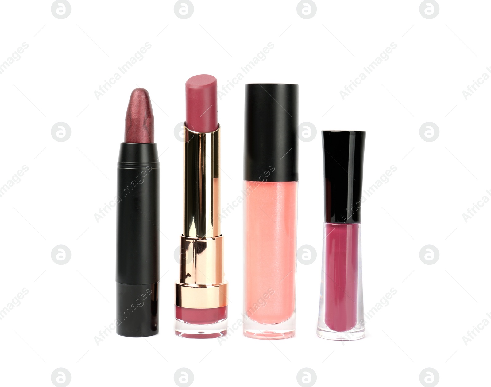 Photo of Set of colorful lipsticks isolated on white