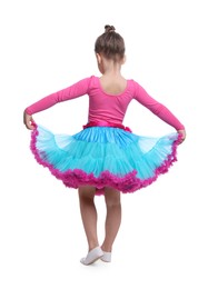 Photo of Cute little girl in costume dancing on white background, back view