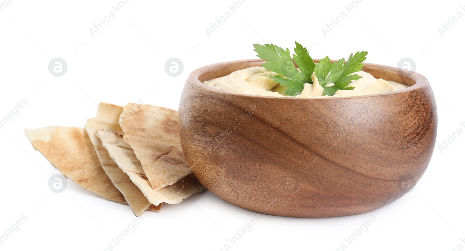 Photo of Delicious hummus with pita chips and parsley on white background