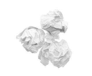 Crumpled sheets of paper on white background, top view