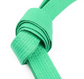 Green karate belt isolated on white. Martial arts uniform