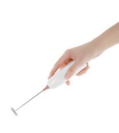 Photo of Woman holding milk frother wand on white background, closeup