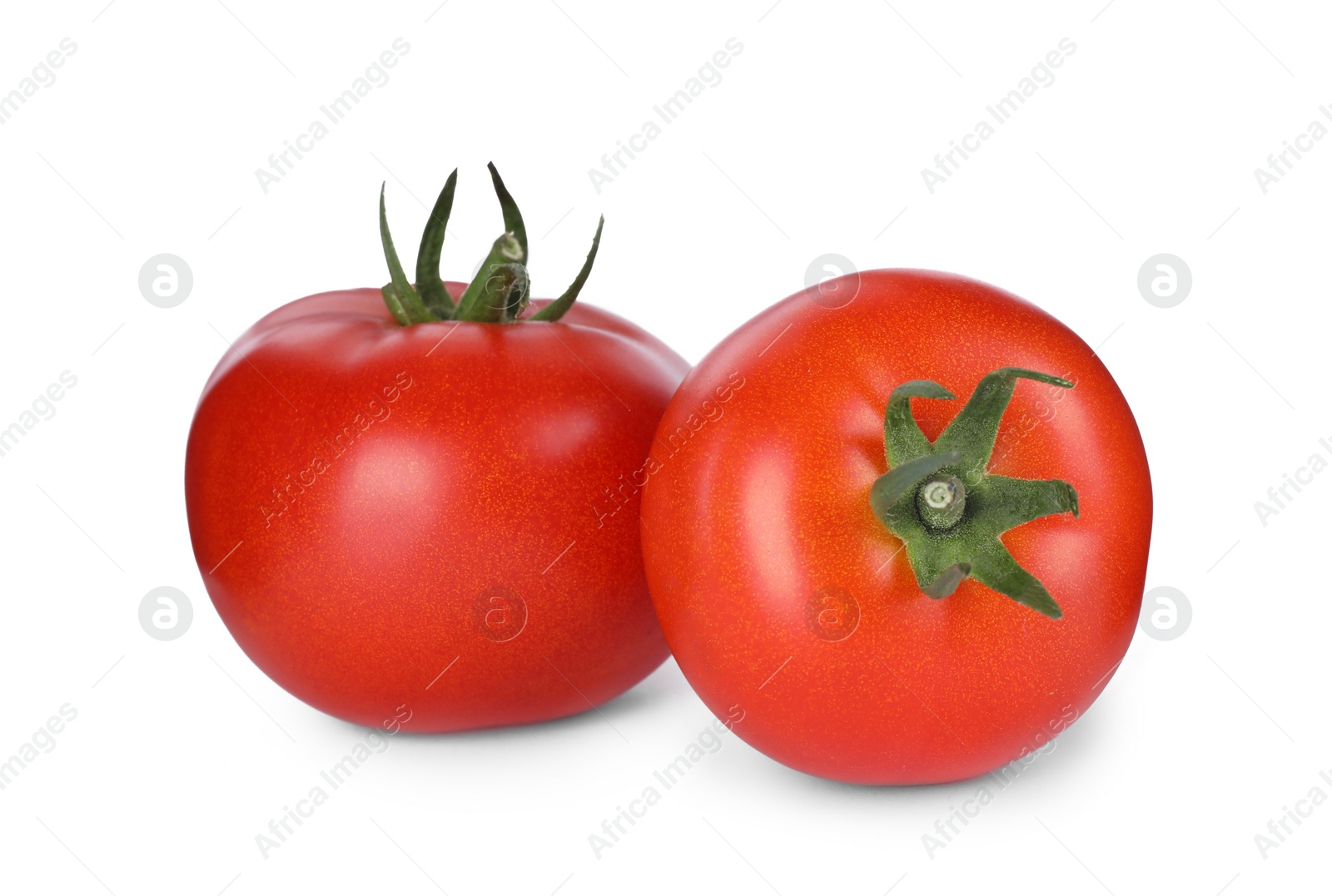 Photo of Tasty ripe tomatoes with leaves isolated on white