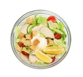 Photo of Bowl of delicious salad with Chinese cabbage, meat and bread croutons isolated on white, top view