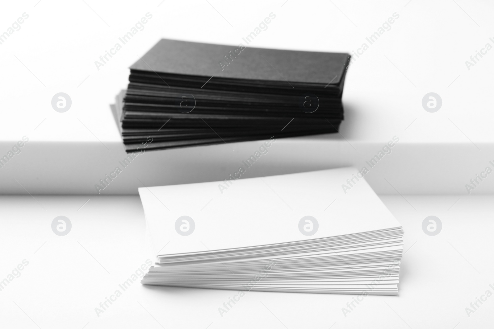 Photo of Business cards on white background. Mockup for design