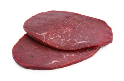 Slices of tasty bresaola isolated on white