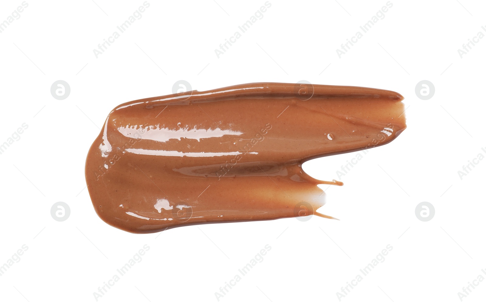 Photo of Smear of tasty melted milk chocolate isolated on white, top view