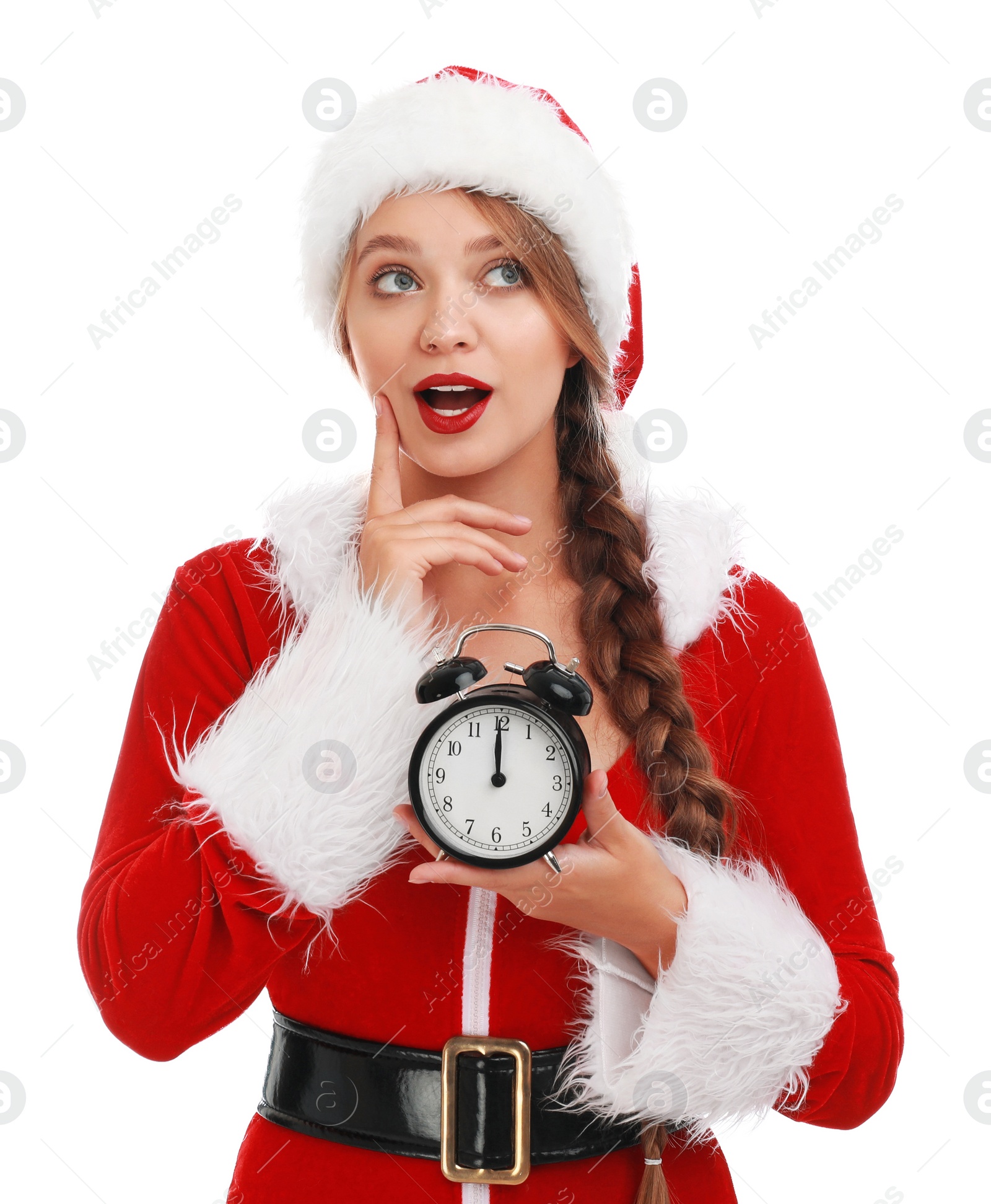 Photo of Beautiful Santa girl with alarm clock on white background. Christmas eve