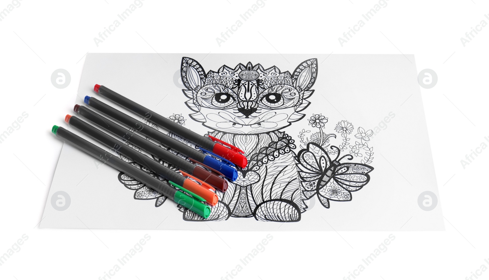 Photo of Antistress coloring page and felt tip pens on white background