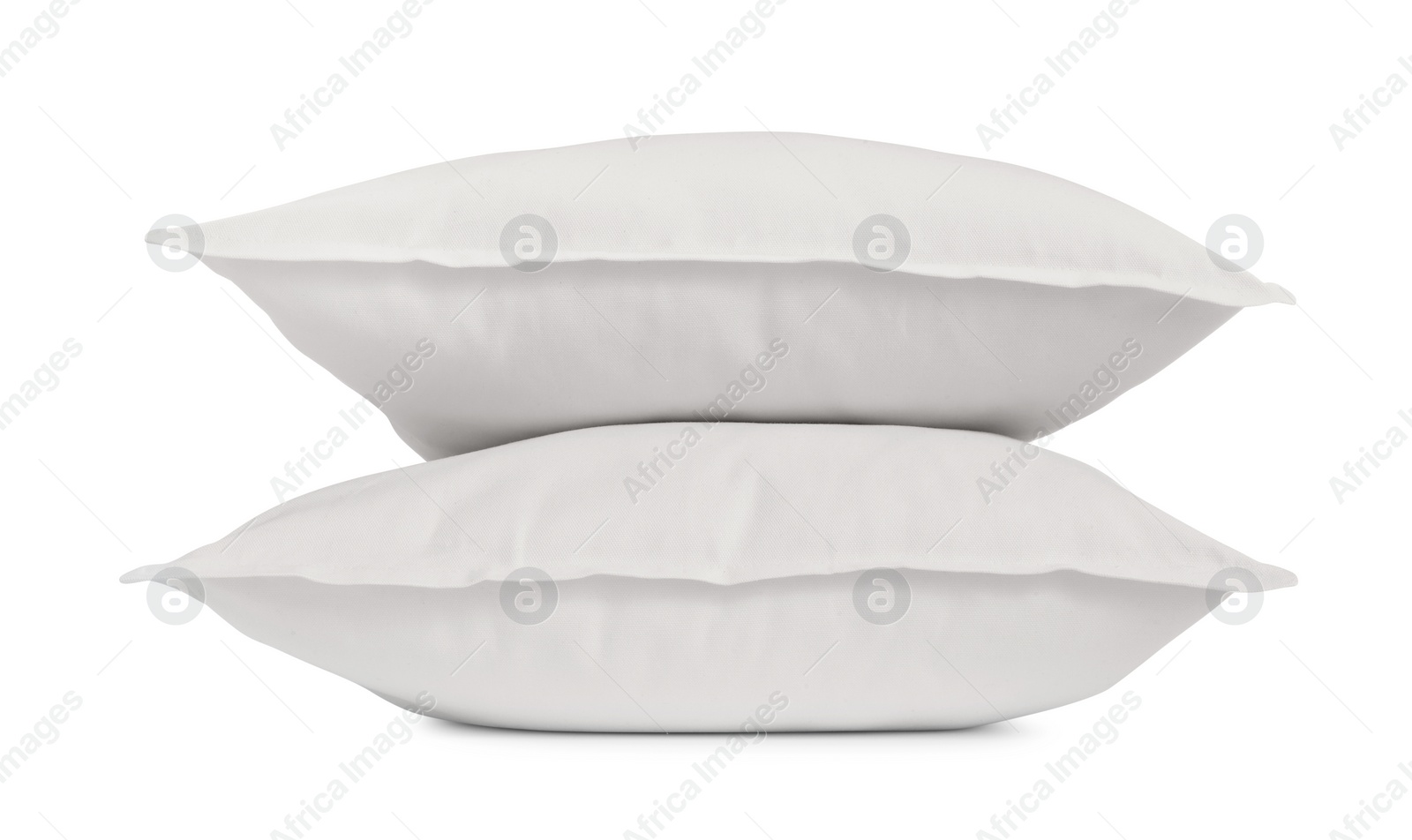 Photo of Two new soft pillows isolated on white