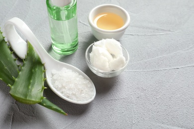 Photo of Ingredients for natural body scrub on grey background