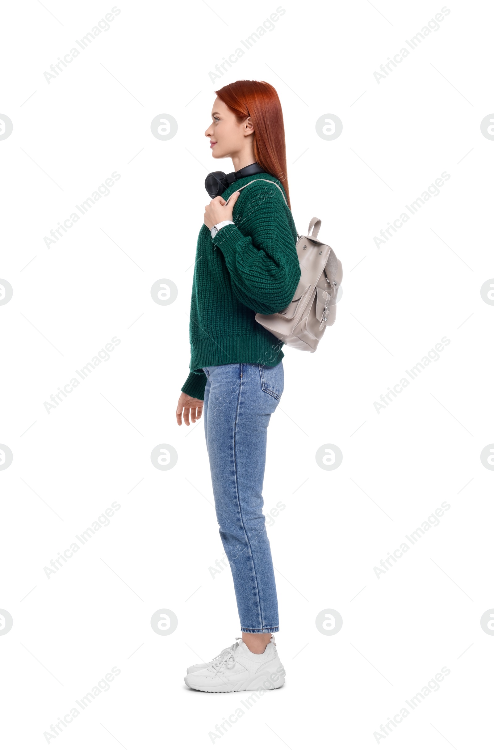 Photo of Woman with headphones and backpack on white background