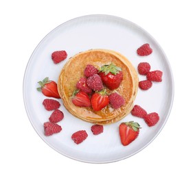 Tasty pancakes with fresh berries and honey on white background, top view