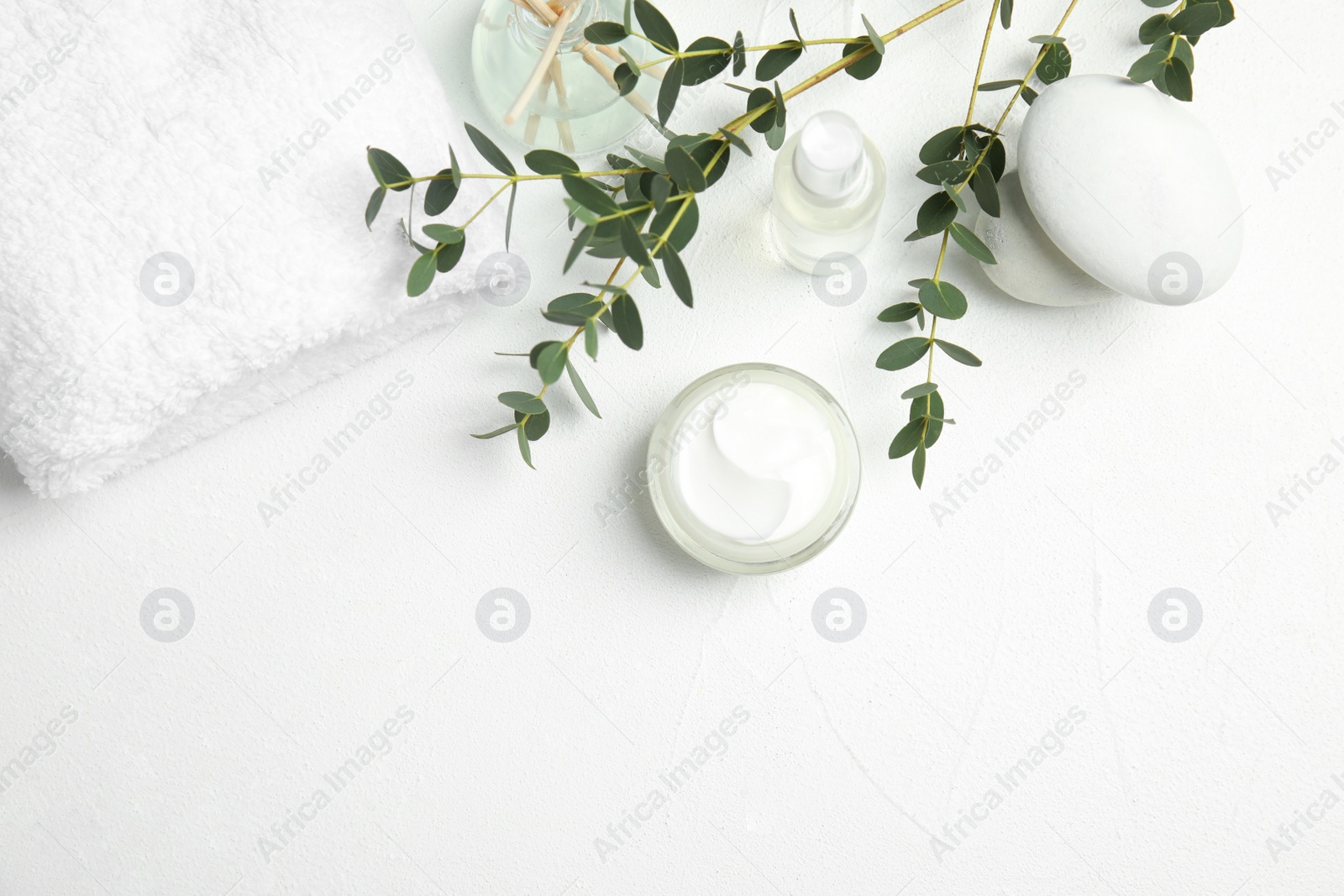 Photo of Flat lay composition with different body care products and space for text on white background