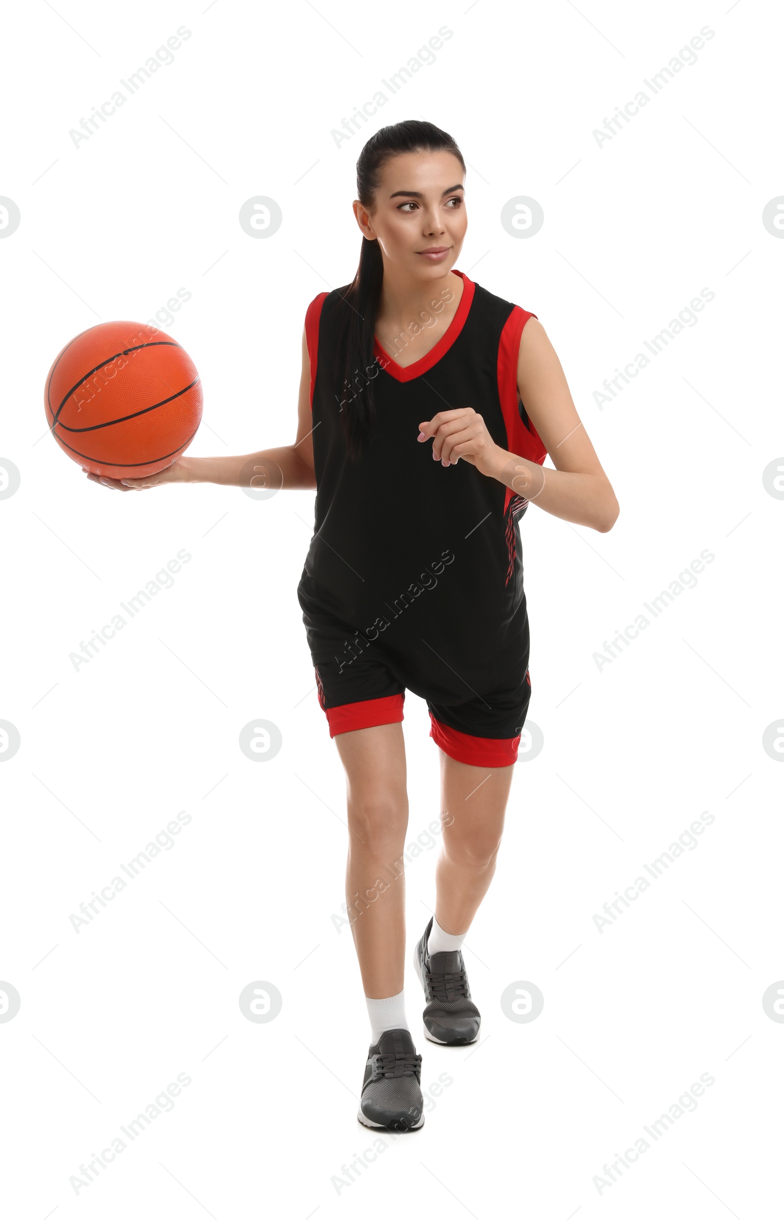 Photo of Basketball player with ball on white background