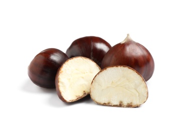 Photo of Fresh sweet edible chestnuts on white background