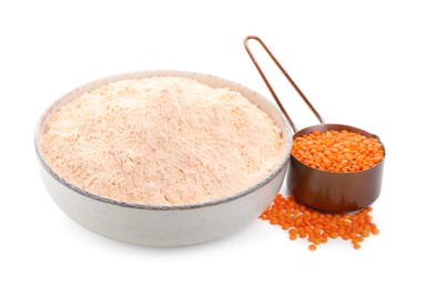 Lentil flour in bowl and seeds isolated on white