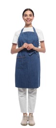 Photo of Young woman in blue jeans apron on white background