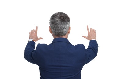 Photo of Mature businessman in stylish clothes posing on white background, back view