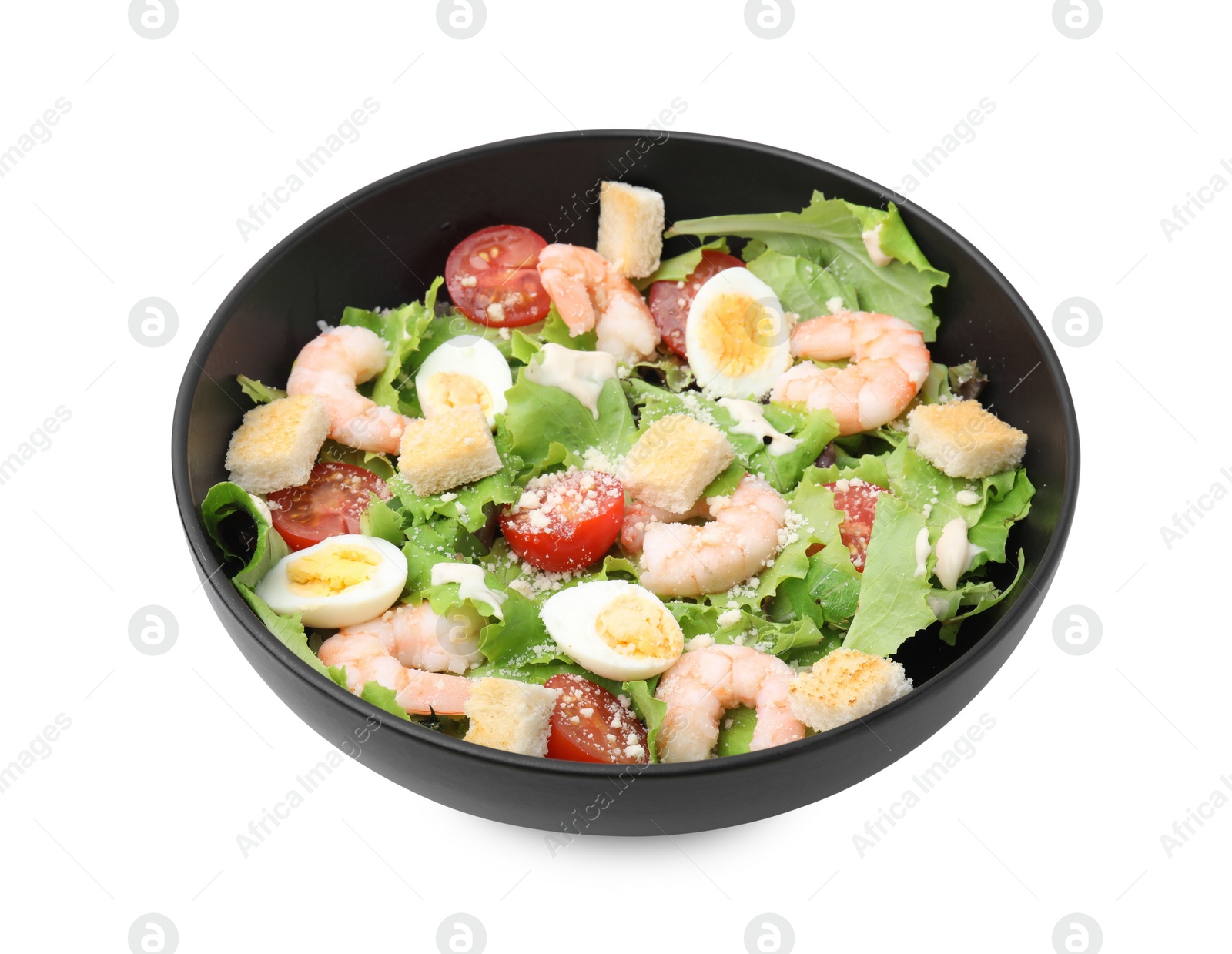 Photo of Delicious Caesar salad with shrimps isolated on white