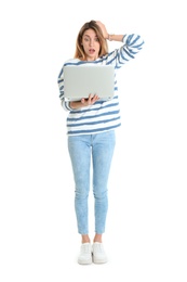 Full length portrait of shocked young woman in casual outfit with laptop on white background