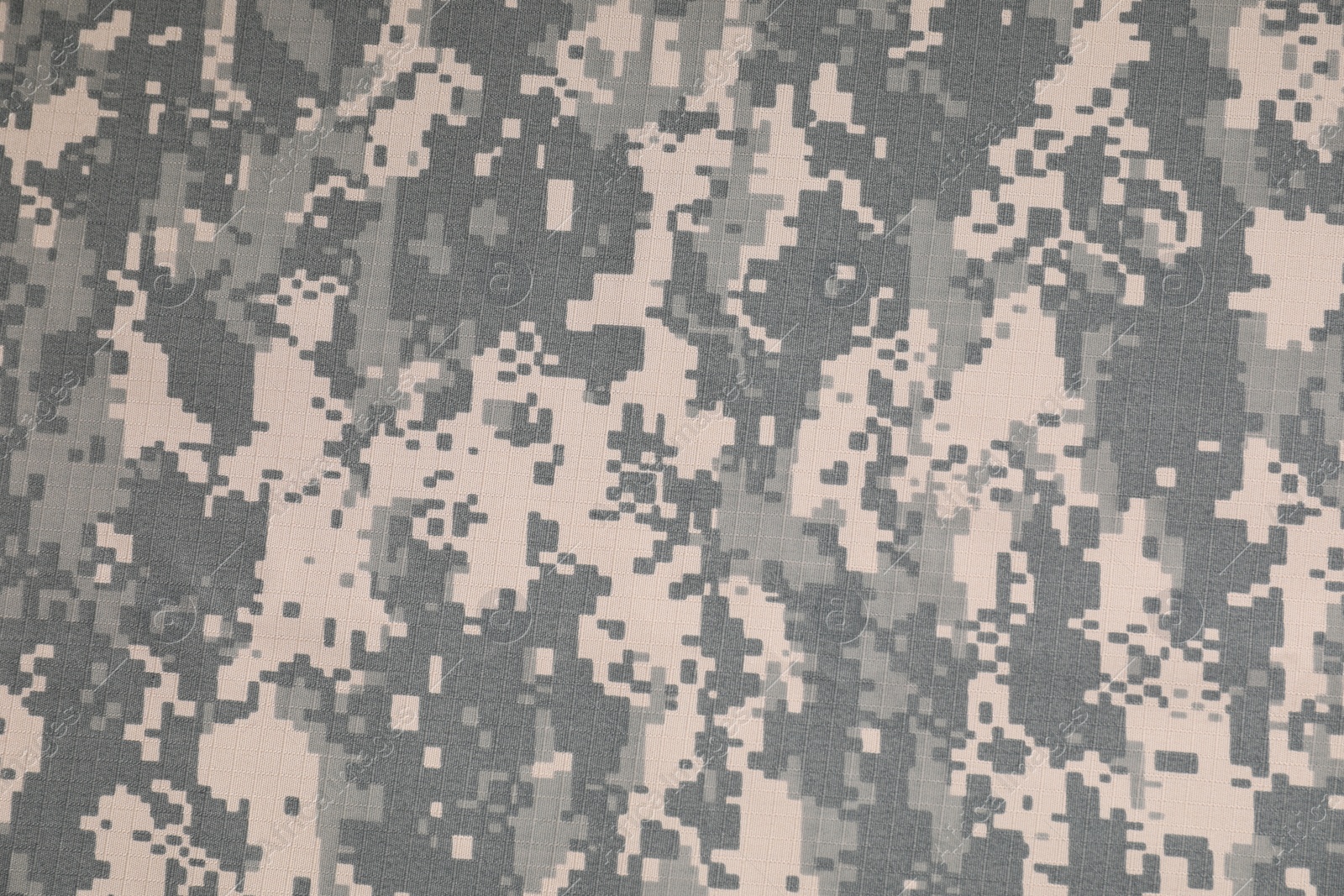 Photo of Texture of camouflage fabric as background, top view