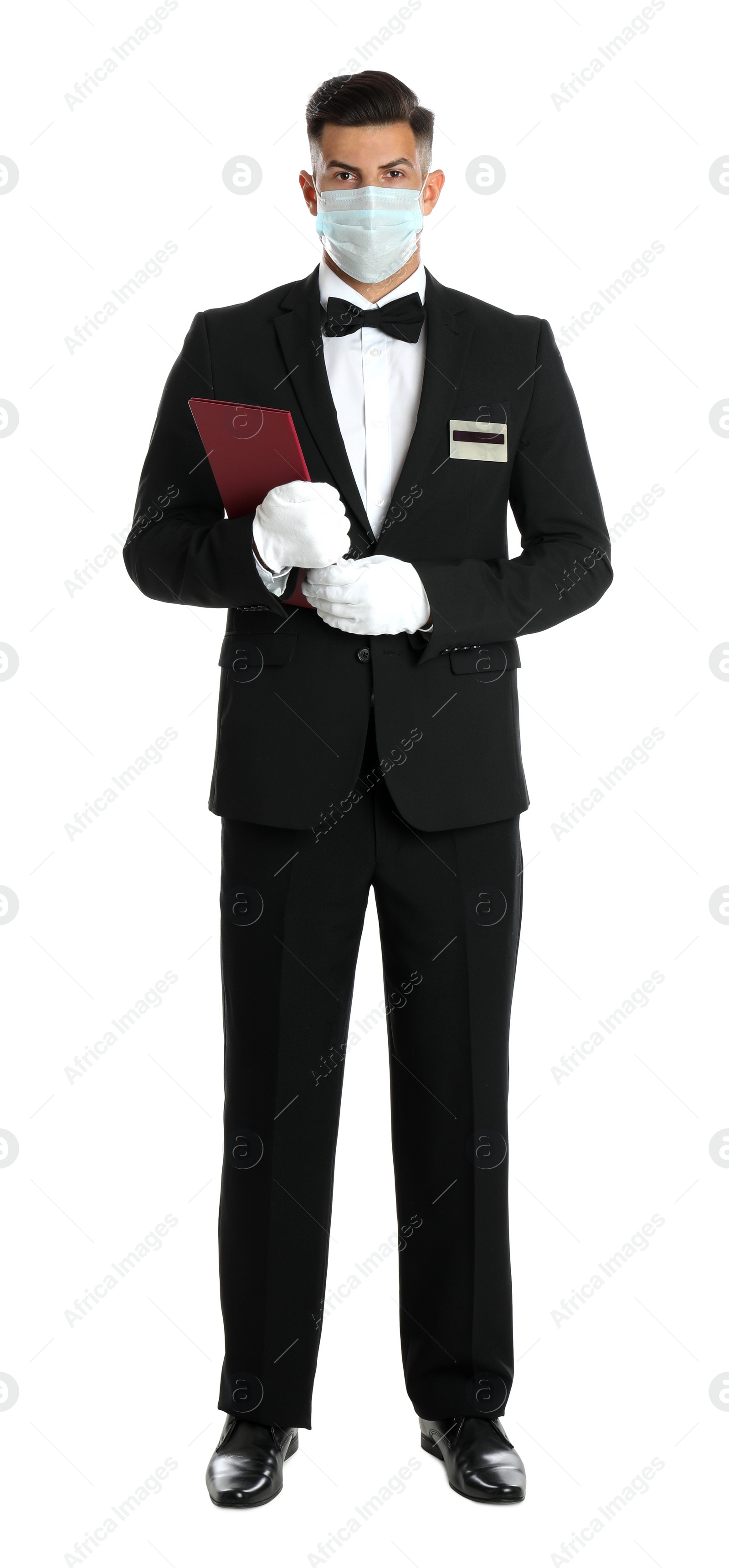 Photo of Waiter in medical face mask with menu on white background