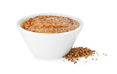 Fresh whole grain mustard in bowl and dry seeds isolated on white