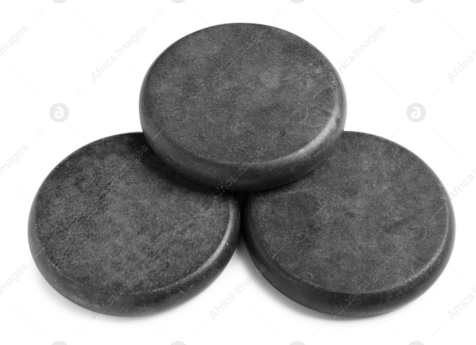 Photo of Group of grey stones on white background