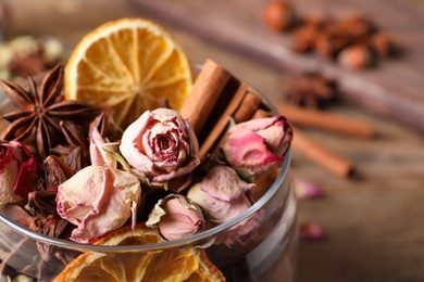 Aroma potpourri with different spices in jar, closeup view