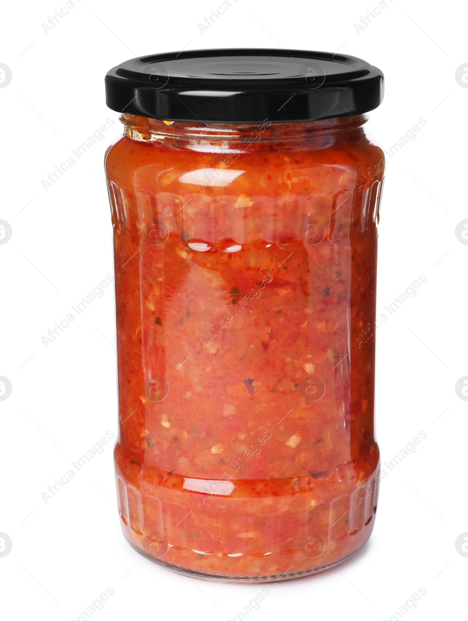 Photo of Glass jar with pickled red sauce isolated on white