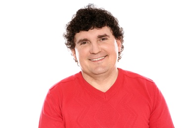 Portrait of handsome mature man posing on white background