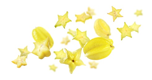 Image of Delicious exotic carambolas flying on white background. Banner design