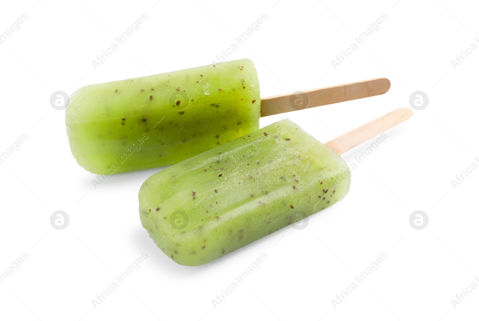 Photo of Tasty kiwi ice pops isolated on white. Fruit popsicle