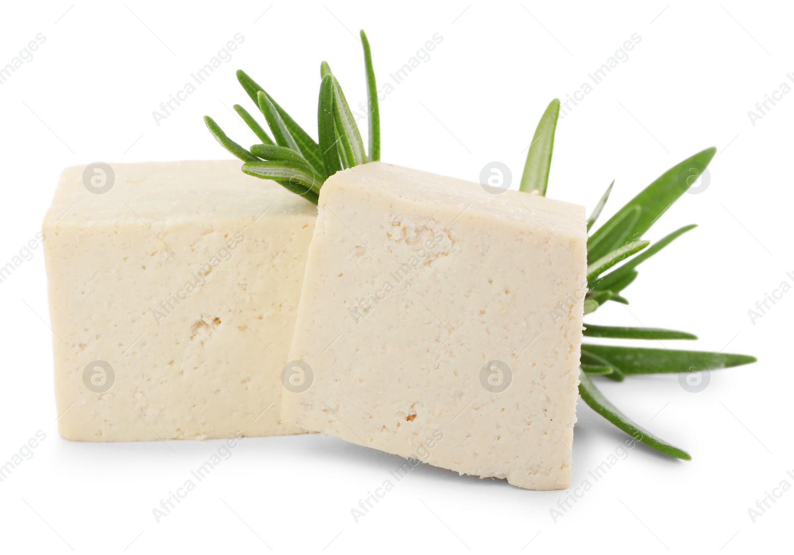 Photo of Delicious tofu and rosemary on white background