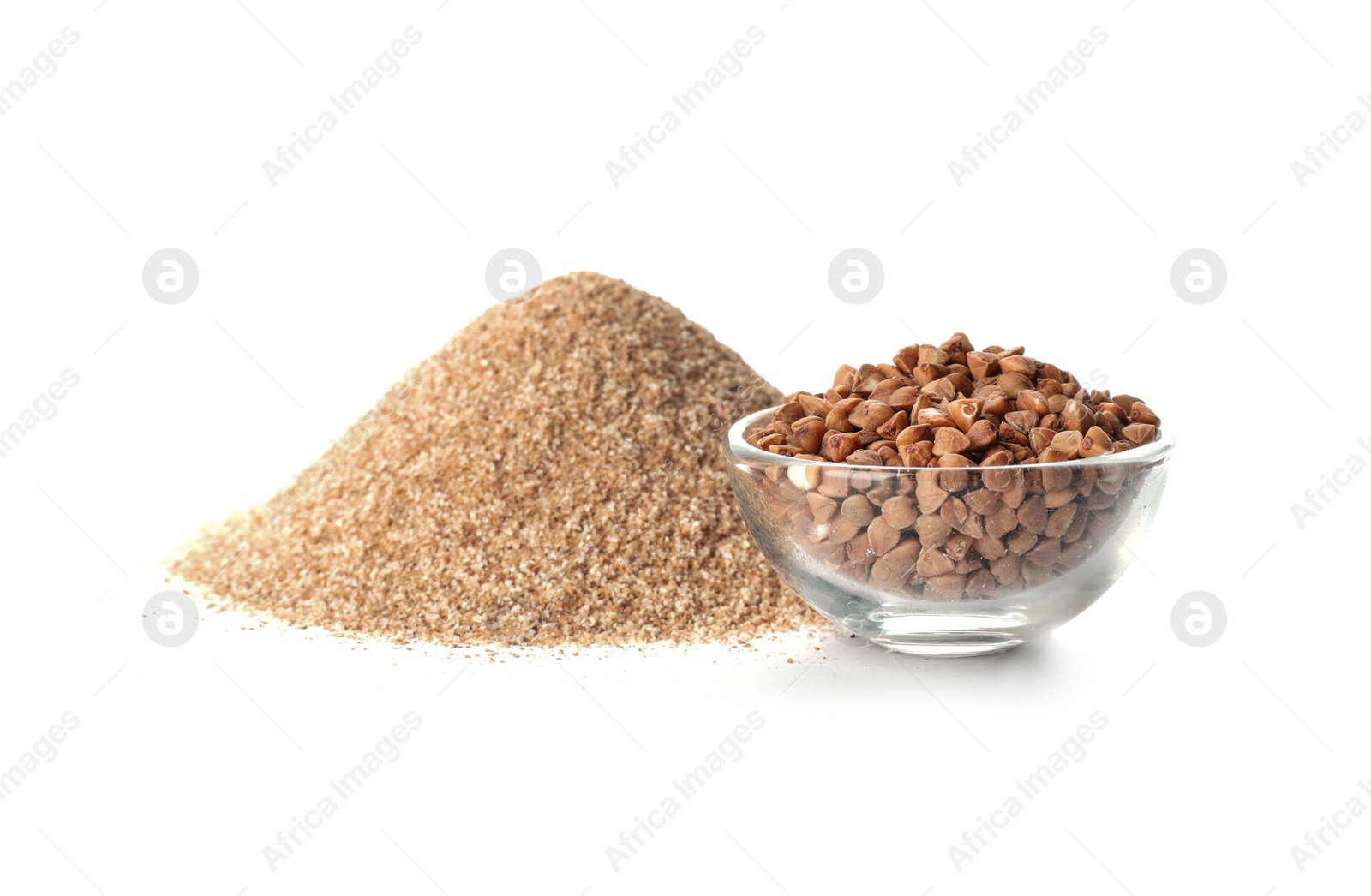 Photo of Pile of fresh flour and bowl with buckwheat isolated on white