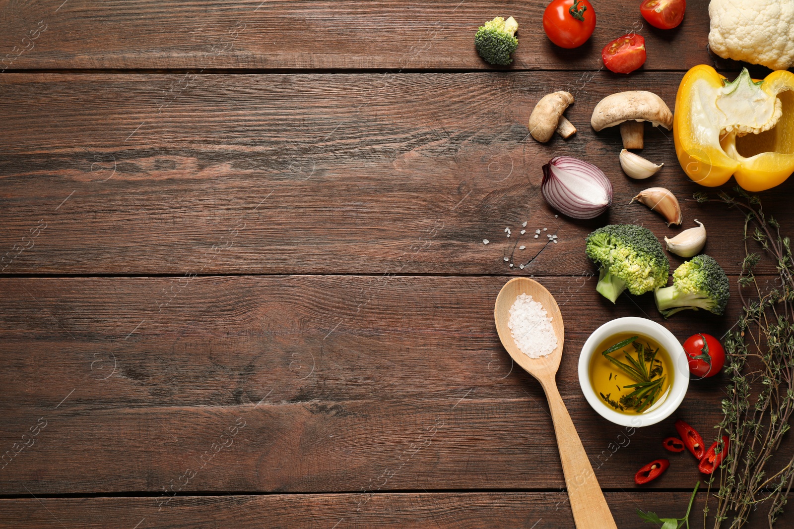 Photo of Flat lay composition with fresh products on wooden table, space for text. Healthy cooking