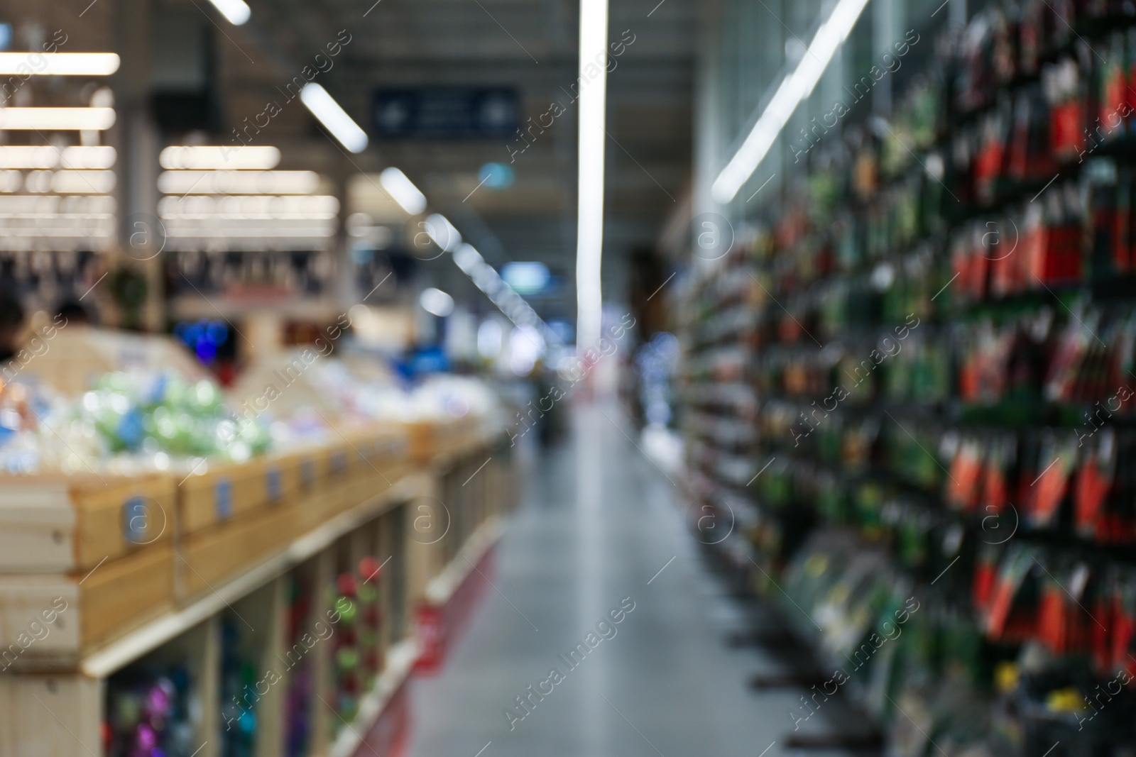 Photo of Blurred view of shopping mall interior. Bokeh effect