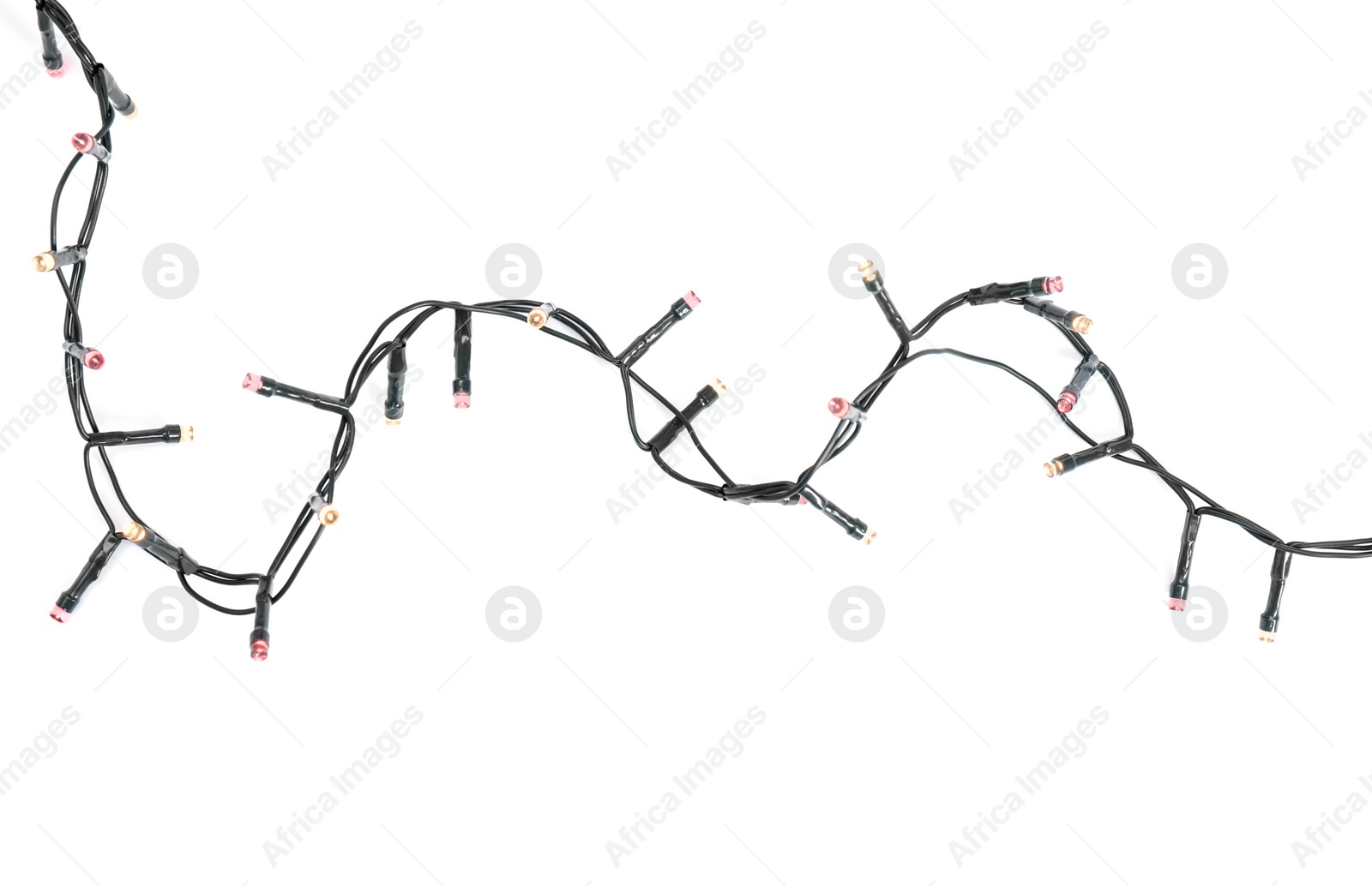 Photo of Beautiful Christmas lights on white background, top view