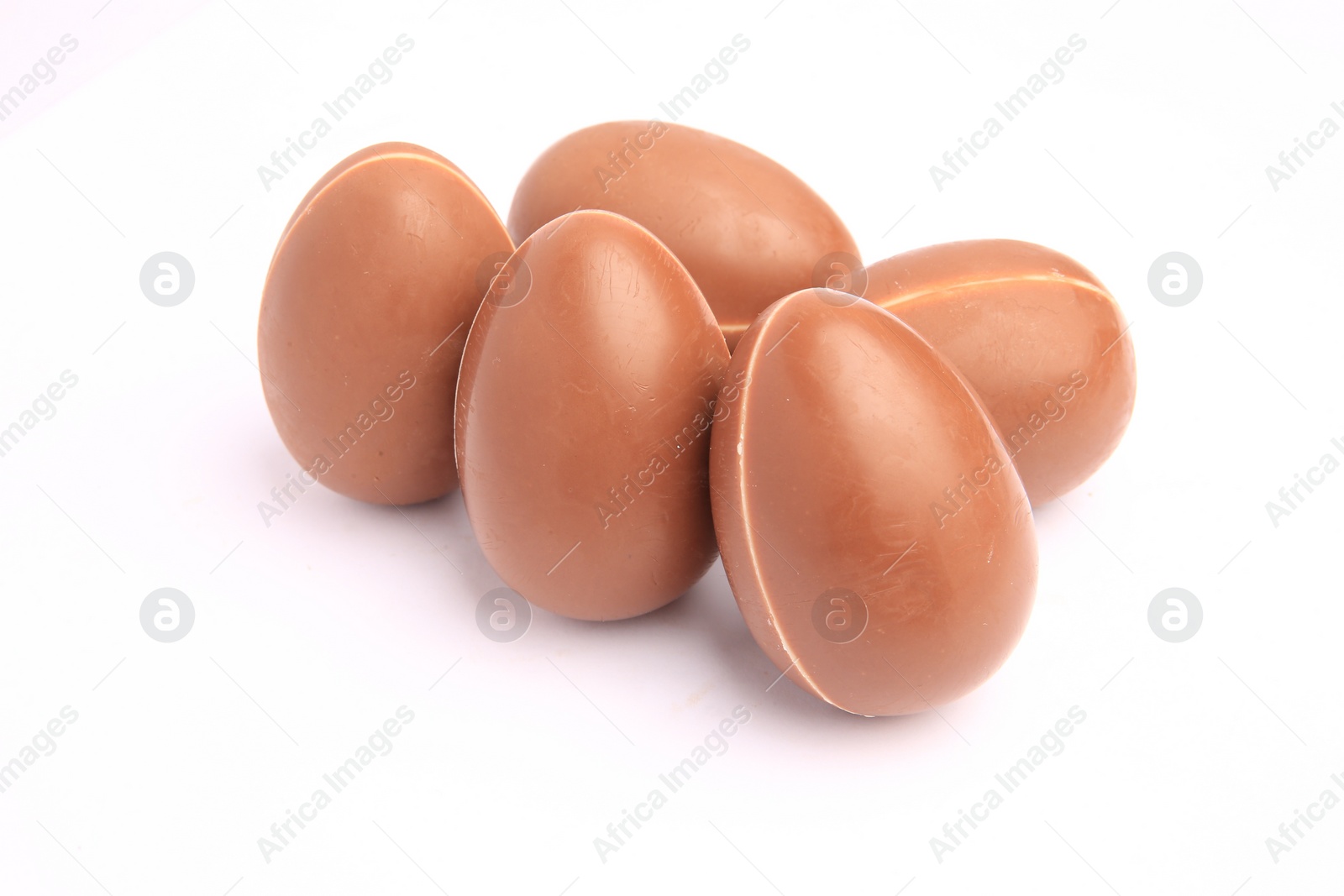 Photo of Sveti Vlas, Bulgaria - June 27, 2023: Unwrapped Kinder Surprise Eggs isolated on white